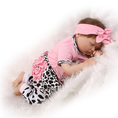 Nice 55 Cm Reborn Doll With Cloth Body And Closed Eyes