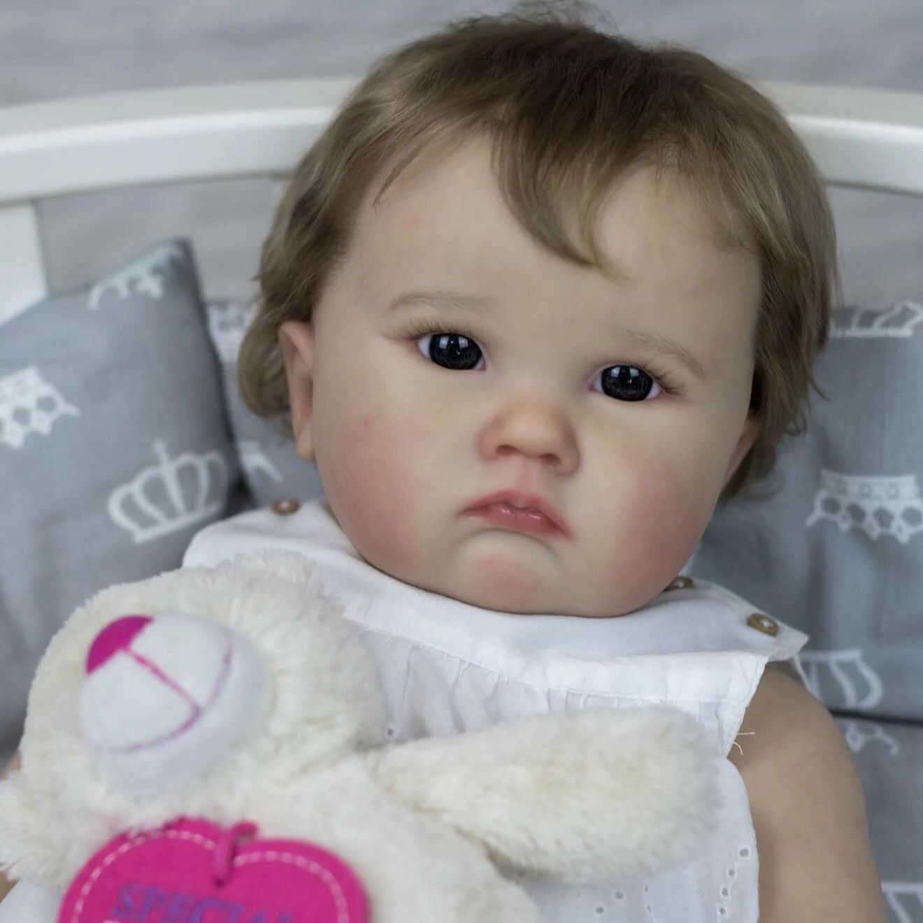 Cheryl 60cm Reborn Doll with blue eyes and brown hair