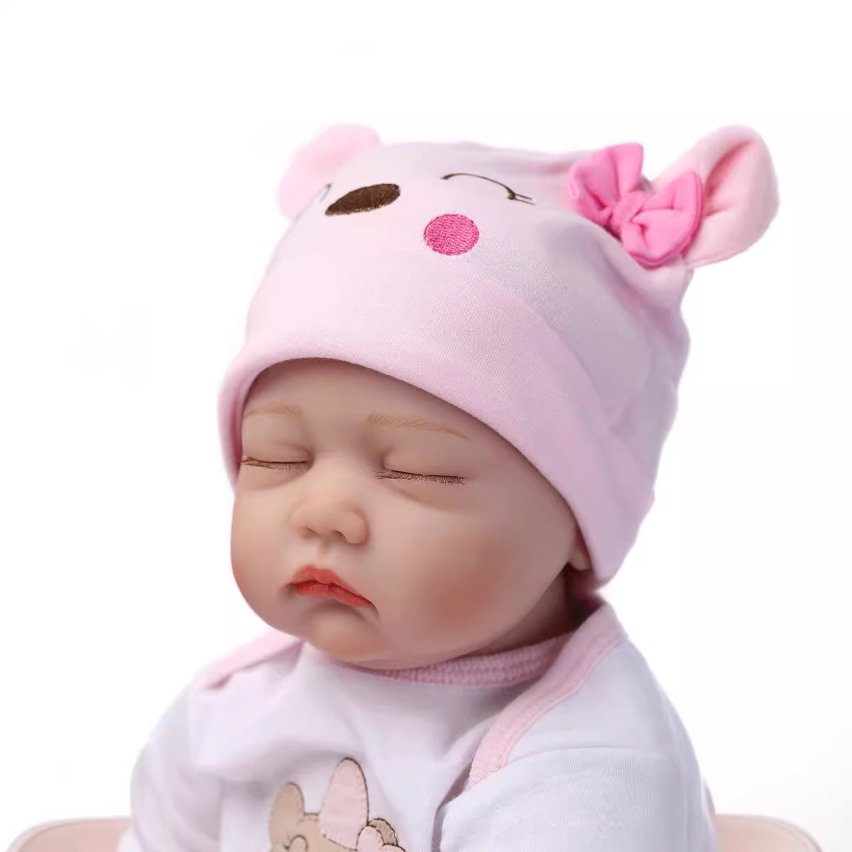 Nice 55 Cm Reborn Doll With Cloth Body And Closed Eyes